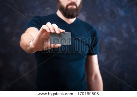 Young Funny Man With Business Card For The Holiday 01