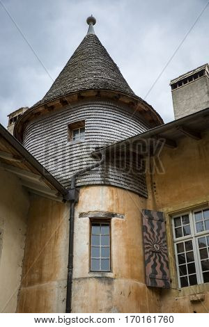 mountain village of Romainmotier-Envy old medieval house with tower - Switzerland