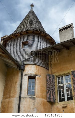 mountain village of Romainmotier-Envy old medieval house with tower - Switzerland