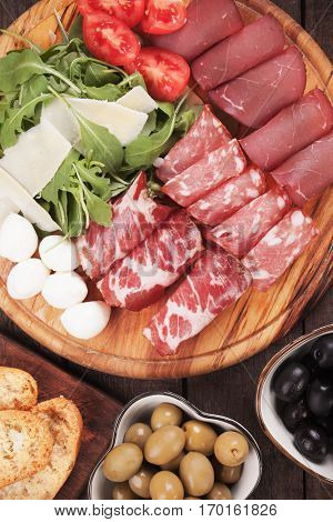 Charcuterie board with italian style cured meat deli