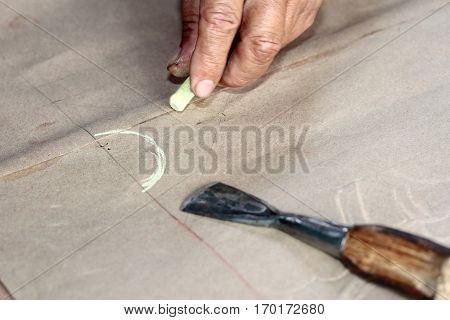 Folk Artisan Draw Lines For Being Original Carved Wood.