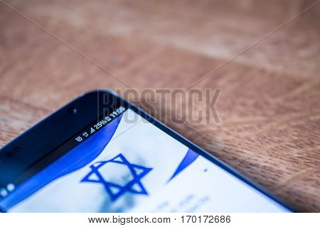 Smartphone With 25 Percent Charge And Israel Flag