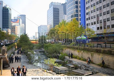 SEOUL - NOV 3, 2015: Han river, people and skyscrapers. Seoul City Hall has published plan for integrated development of area of Han River