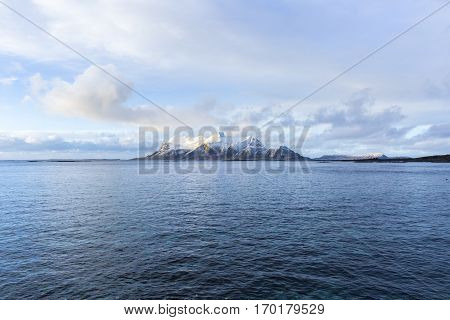 View of a Norwegian fjord with snowy mountains Nordland Norway