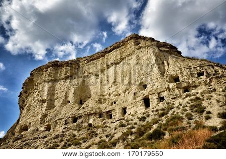 Typical houses in caves in Arguedas, tourist destination in Spain
