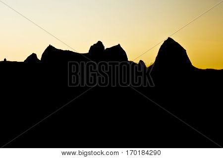 Norwegian landscape with silhouette of a mountain in midnight sun Traena festival 2014