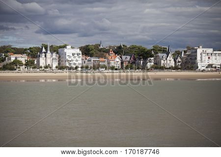 View of the coastline with seaside resort of Royan with grey tourmented sky France
