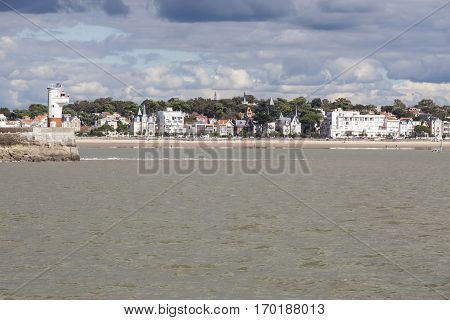 View of the coastline with seaside resort of Royan with grey tourmented sky France