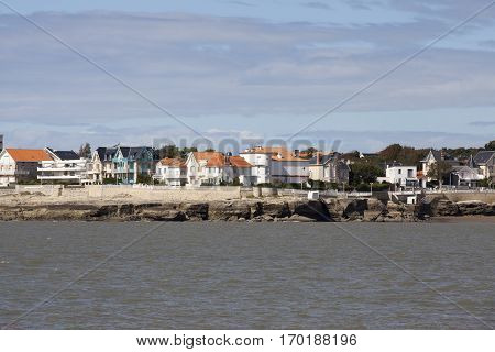 View of the coastline with seaside resort of Royan with grey tourmented sky France
