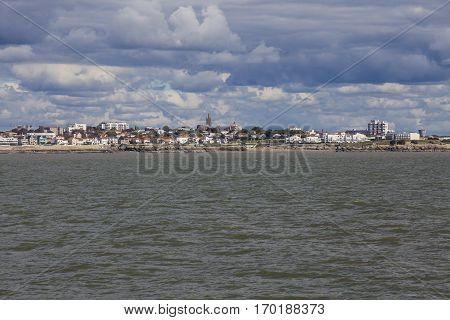 View of the coastline with seaside resort of Royan with grey tourmented sky France