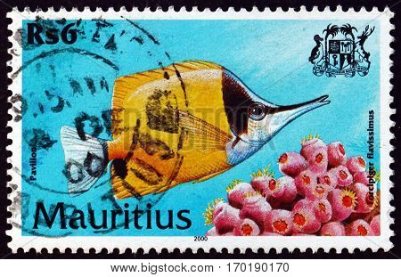MAURITIUS - CIRCA 2000: a stamp printed in Mauritius shows Yellow longnose butterflyfish forcipiger flavissimus is a species of marine tropical fish circa 2000