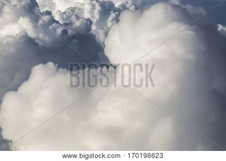 Close up on threatening fluffy storm clouds