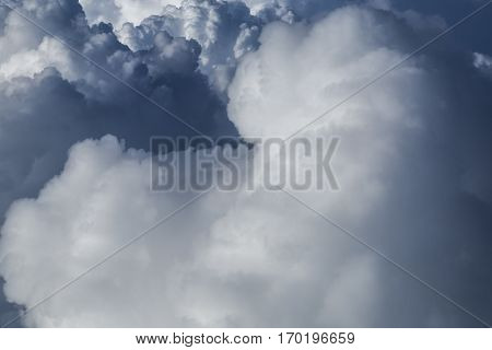 Close up on dark fluffy storm clouds