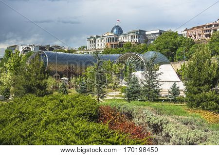 Tbilisi, Georgia - May 5, 2016: two sculptural volumes for a New Cultural Center (foreground) and the Presidential Palace (background) in Tbilisi, Georgia on May 5, 2016