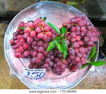 red grapes at the market in Bangkok