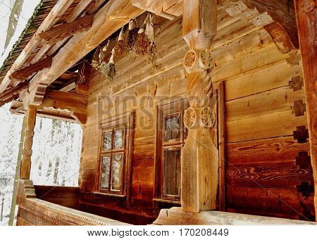 Carving Porch Of An Old Wooden Village Hut