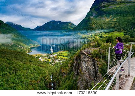 Geiranger fjord, Beautiful Nature Norway panorama. It is a 15-kilometre (9.3 mi) long branch off of the Sunnylvsfjorden, which is a branch off of the Storfjorden (Great Fjord).