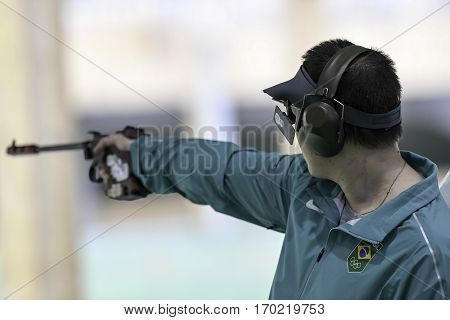 Rio Brazil - august 10 2016: Felipe Almeida Wu (BRA) during shooting 50m Pistol Men Shooting at Olympic Games 2016 in Olympic Shooting Centre Deodoro