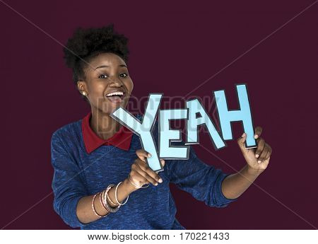 Smiling African Woman Holding Yeah Word
