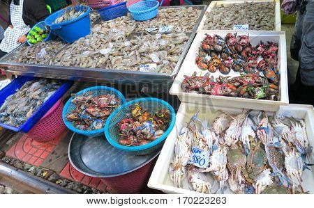 crabs and fish at the market in Bangkok