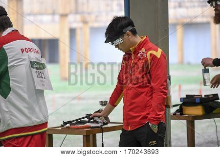 Rio Brazil - august 10 2016: PANG Wei (CHN) during shooting 50m Pistol Men Shooting at Olympic Games 2016 in Olympic Shooting Centre Deodoro