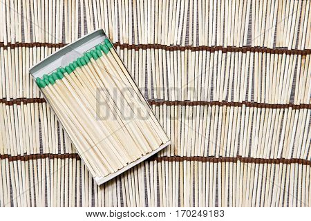 Matches rows folded. Background from matches. abstract.