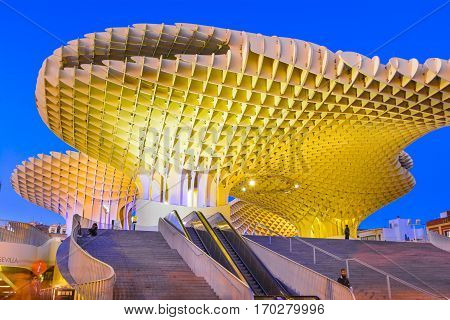 Seville, Spain - 2 November 2016: Metropol Parasol in Plaza de la Encarnacion. J. Mayer H. architects, it is made from bonded timber with a polyurethane coating