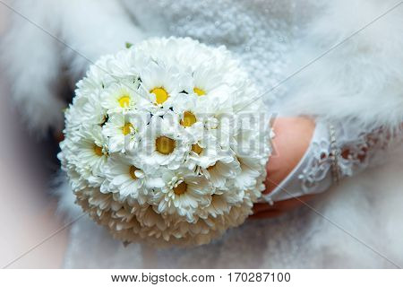 Beautiful wedding bouquet of white flowers the bride holds