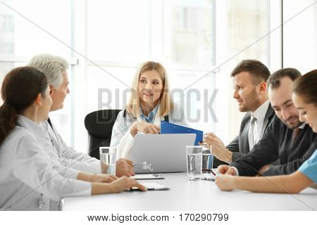 Team of doctors having meeting in clinic