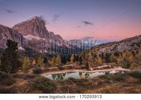 Italy. Dolomites. Evening view of the lake Limides and mount Tofana di Rozes