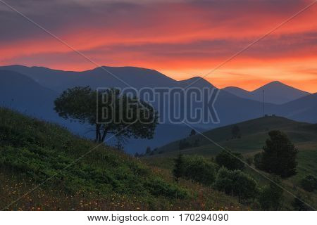 Ukraine. Carpathians. Dzembronya. Sunset sky in the mountains Kosarische