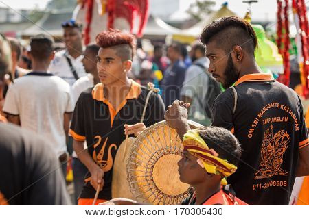 Georgetown Penang Malaysia - February 9 2017 : Group of young musicians as a Hindu devotee taking part in the Thaipusam festival on February 9 2017 in Malaysia. Hindu festival to worship God Muruga.