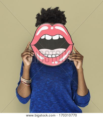 African Woman holding Paper Mouth Over her Face