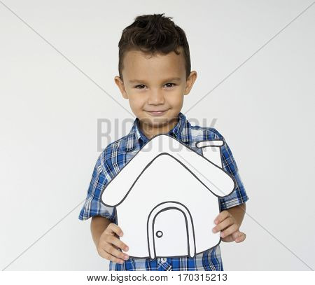 Boy Holding Papercraft Home Icon Family