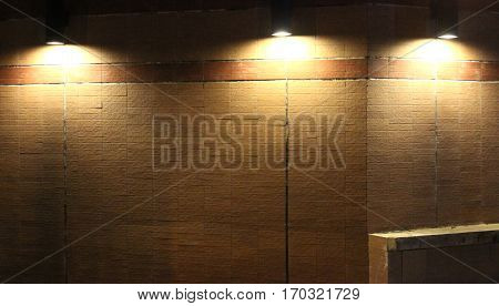 Brick Wall is light at  night .