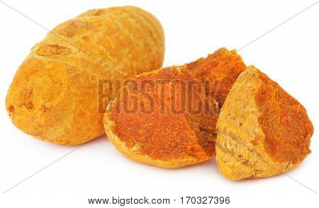 Close up of Pieces of turmeric over white background