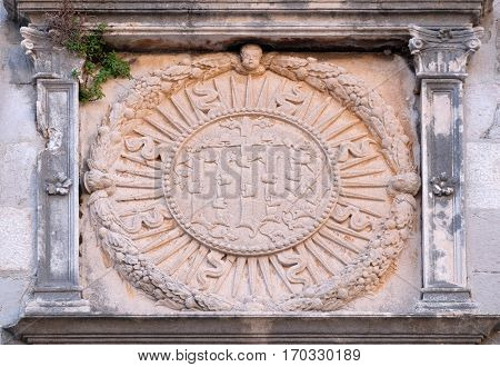 DUBROVNIK, CROATIA - NOVEMBER 29: IHS sign on church facade in Dubrovnik, Croatia on November 29, 2015.