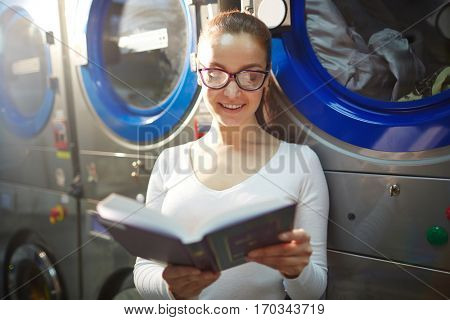 Laundress reading