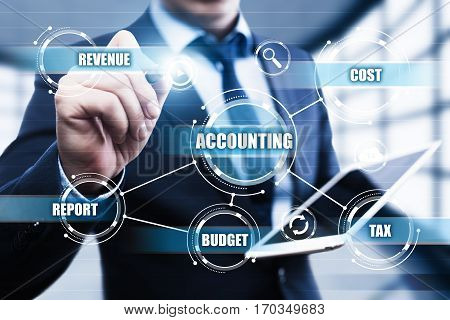 businessman pressing button on virtual screens in modern office