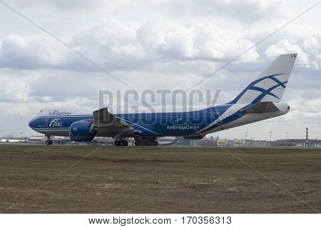 MOSCOW, RUSSIA - APRIL 15, 2015: Boeing 747-8 ( onboard VQ-BLQ) airlines Air Bridge Cargo on the taxiway at the airport Sheremetyevo