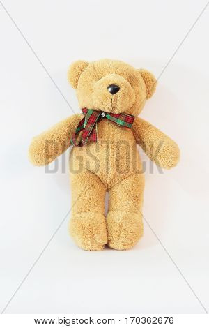 Brown teddy bear on a white background.