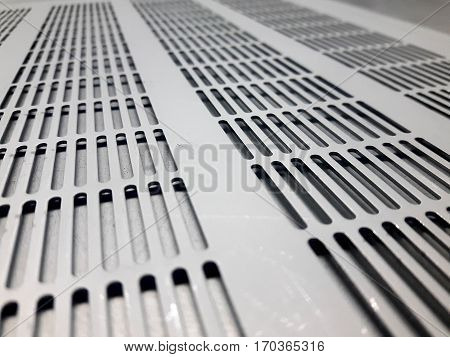 Nice implementation of a perforated metal background