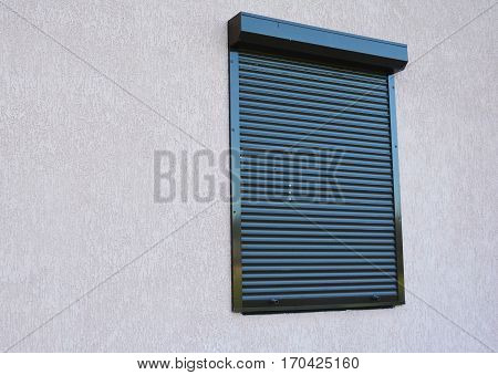 House Window with rolling shutter installation. Rolling Shutter.