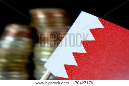 Bahraini Flag Waving With Stack Of Money Coins Macro