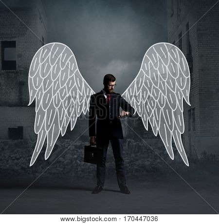 Business angel standing over apocalyptic background. Crisis, default, setback concept.