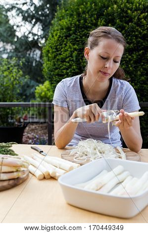 Woman With Green And White Asparagus