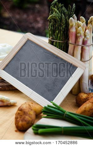 Asparagus, Potatoes, Empty Blackboard