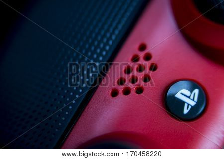 VALENCIA, SPAIN - FEBRUARY 3: Close up macro view from Dualshock 4 wireless controller for playstation 4 magma red on February 3, 2017 in Valencia, Spain