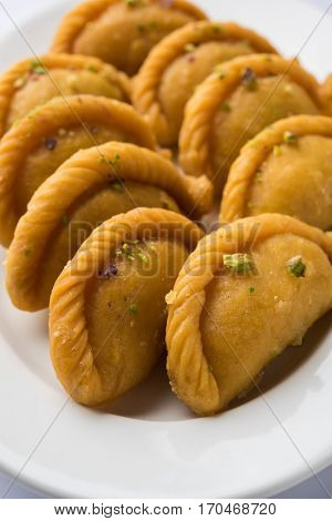 Gujiya - sweet dumplings made during the festival of holi and diwali, selective focus