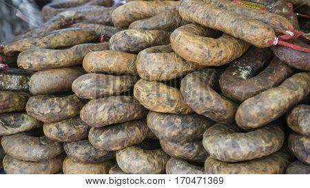 Lot of homemade sausages, typical Spanish food, pickles in vinegar